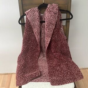 Small fluffy maroon vest